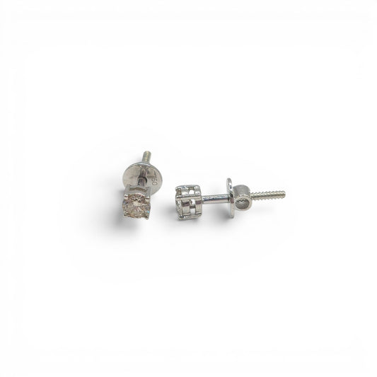 18ct white gold diamond stud earrings by Reeves and Sons, featuring sparkling diamonds set in classic earings style.