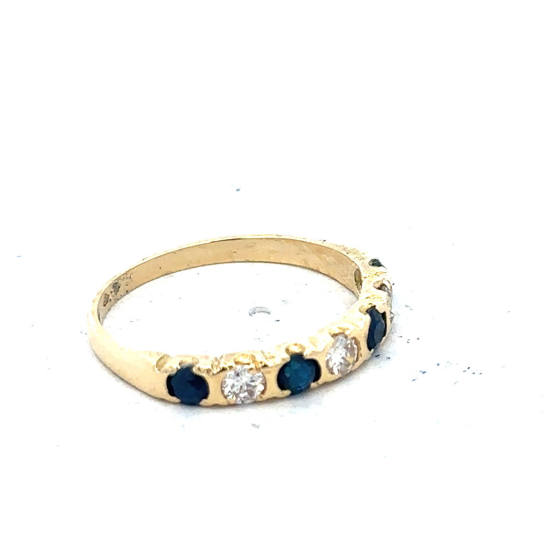 18ct yellow gold diamond and sapphire ring, size M 1/2, featuring a sparkling gemstone design and elegant craftsmanship.