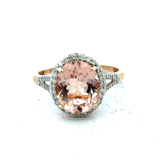 14ct gold Morgantite and diamond ring in size S, featuring a detailed design and sparkling stones.