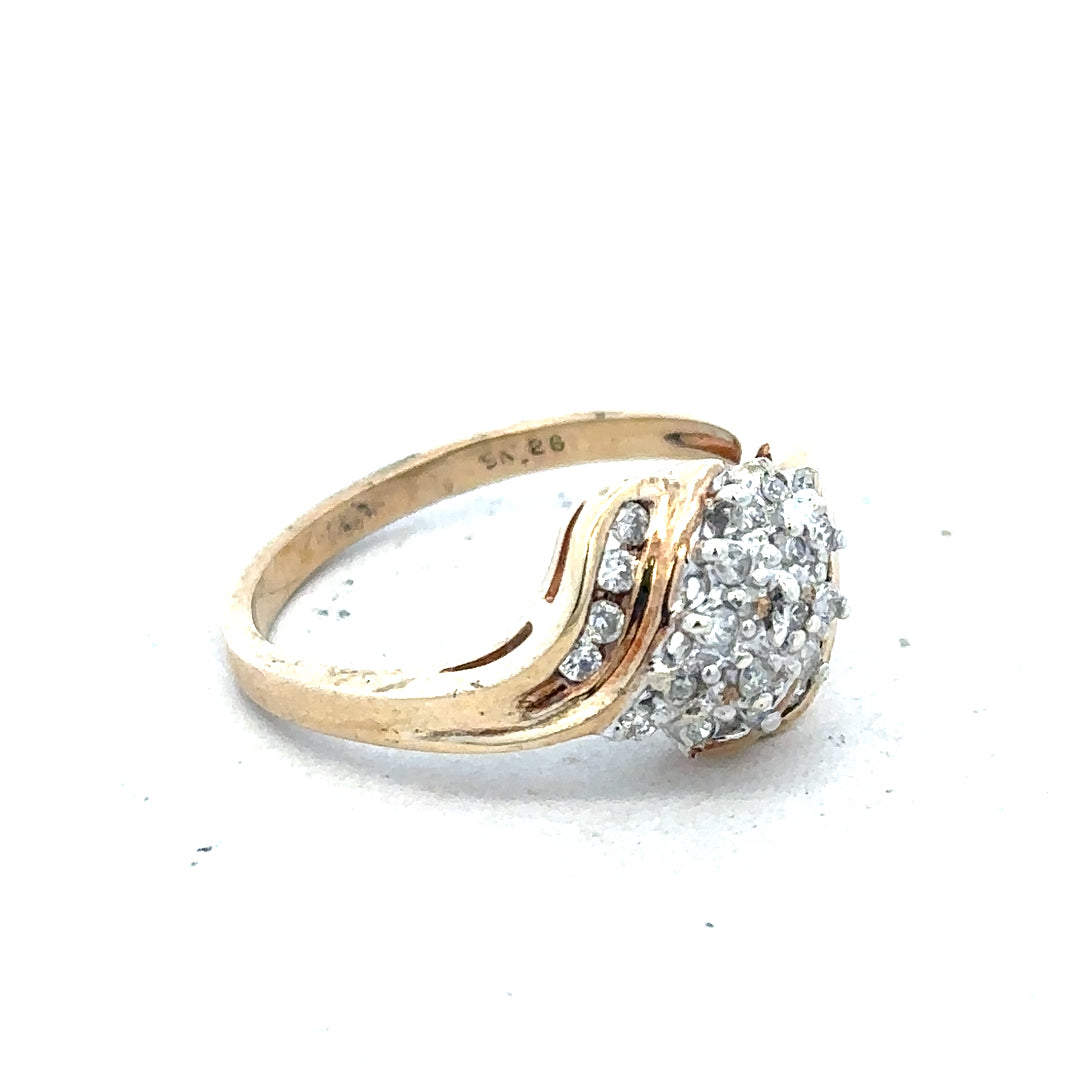 9ct yellow gold diamond ring with 0.26 carats, size P, featuring a sparkling central diamond and a sleek band design.