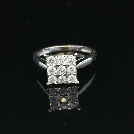9ct white gold diamond ring with half-carat solitaire diamond, featuring a sleek band and sparkling central stone.