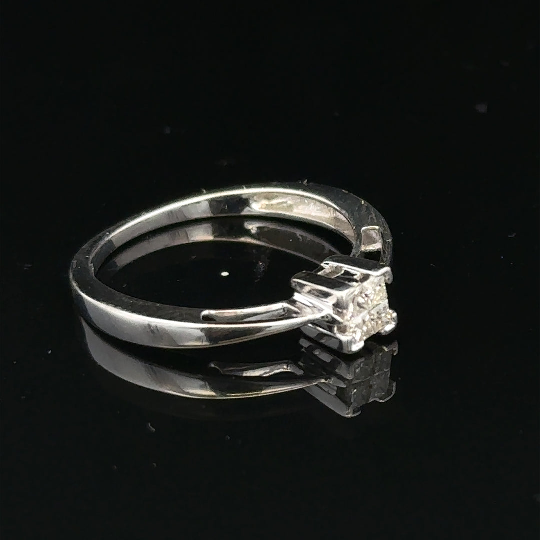Elegant 9ct white gold diamond ring with sparkling diamonds, showcasing fine craftsmanship and timeless design.