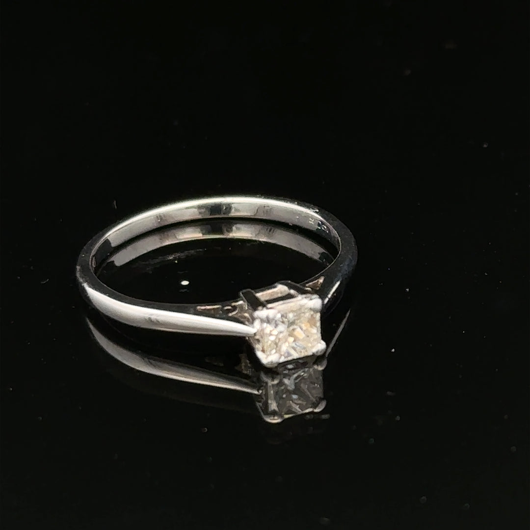 18ct yellow gold princess cut diamond ring with 1/3 carat total weight in size M, featuring a sleek and elegant design.