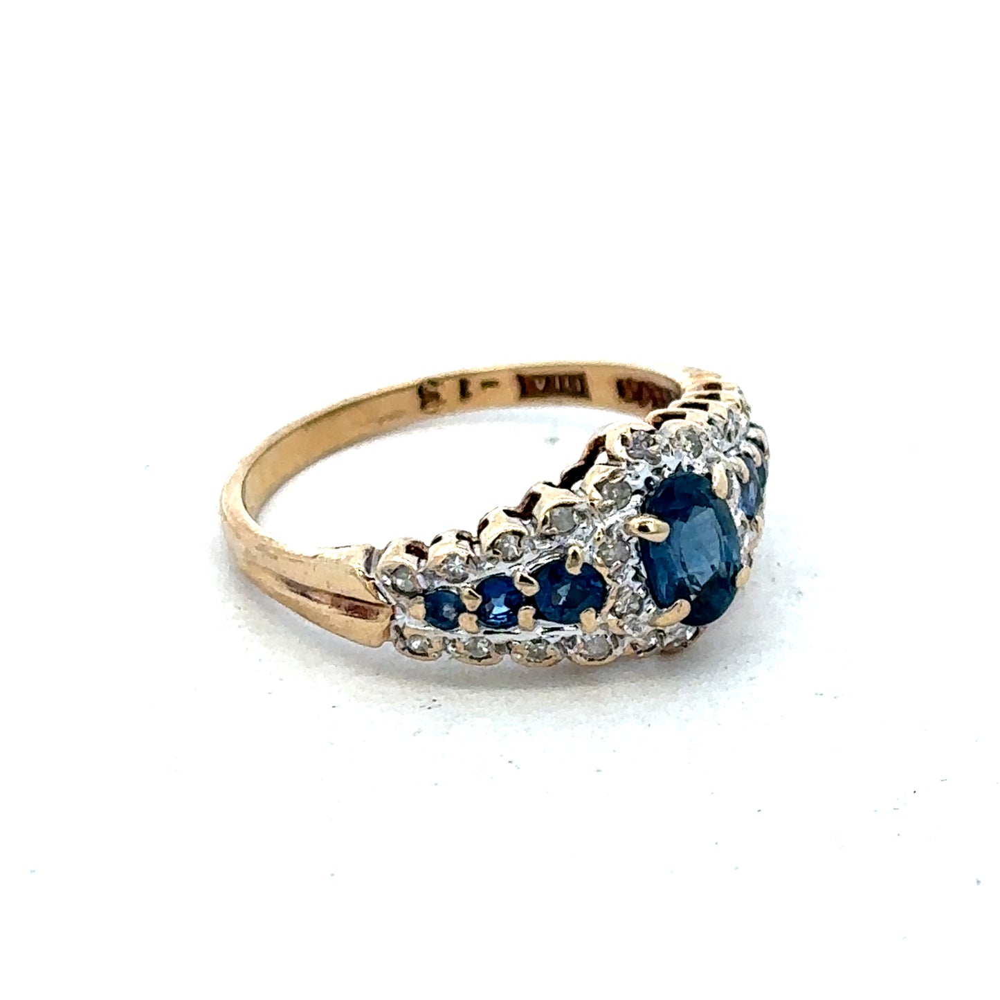 9ct yellow gold diamond ring by Reeves and Sons featuring sparkling diamonds and a classic design.