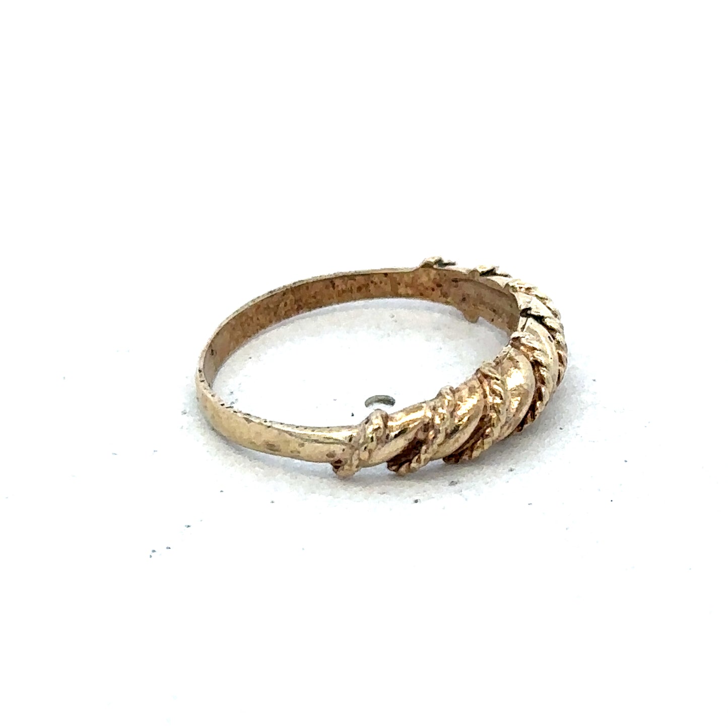 9ct yellow gold ring in size K with a polished finish, featuring a smooth band design by Reeves and Sons.