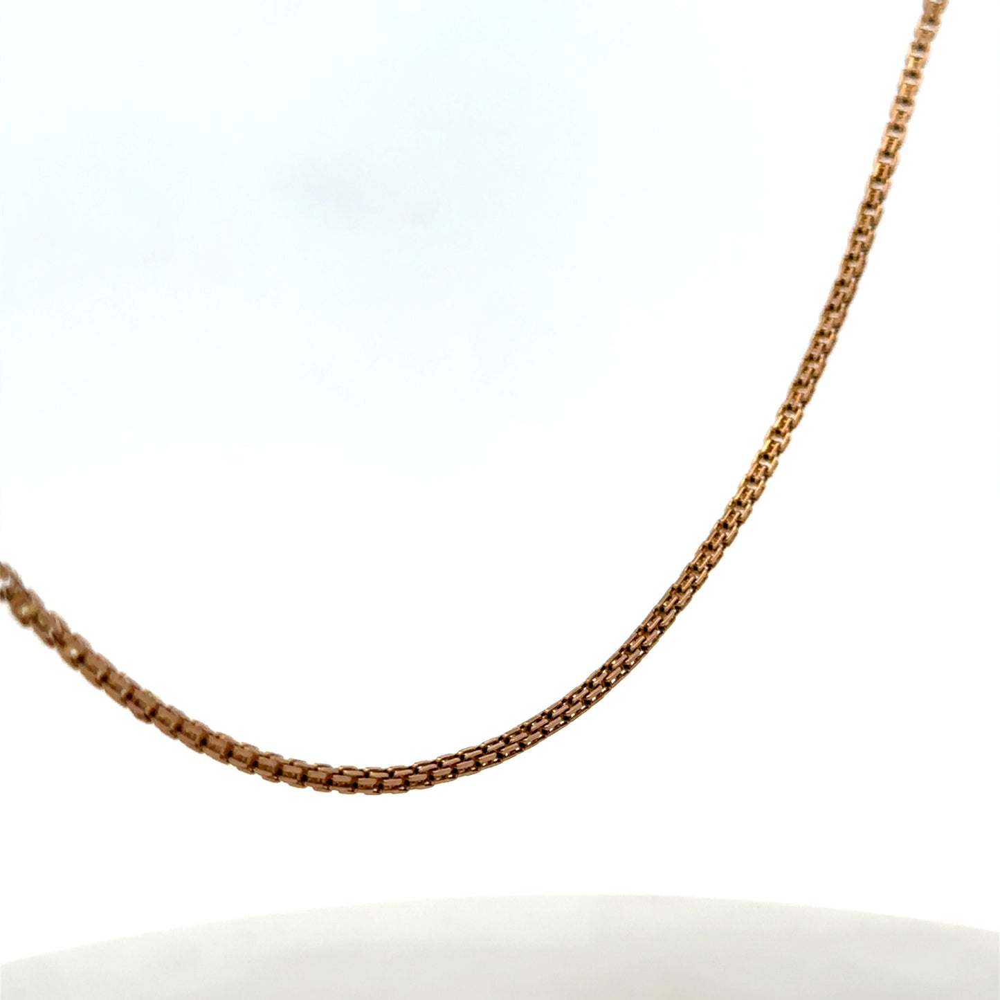 9ct yellow gold chain with a delicate link design, weighing 6.5 grams, by Reeves and Sons.