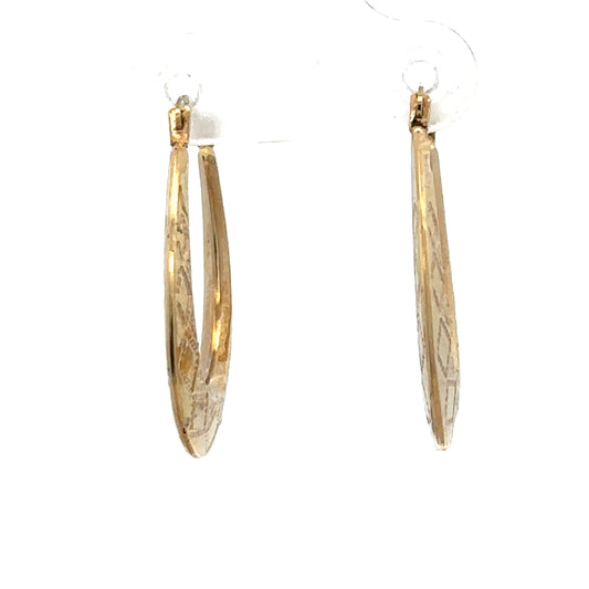 Reeves and Sons 9ct yellow gold hoop earrings, lightweight 0.6g, featuring classic circular design for everyday wear.