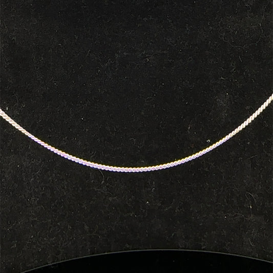 9ct white gold chain weighing 2.9g, featuring a delicate link design from Reeves and Sons.