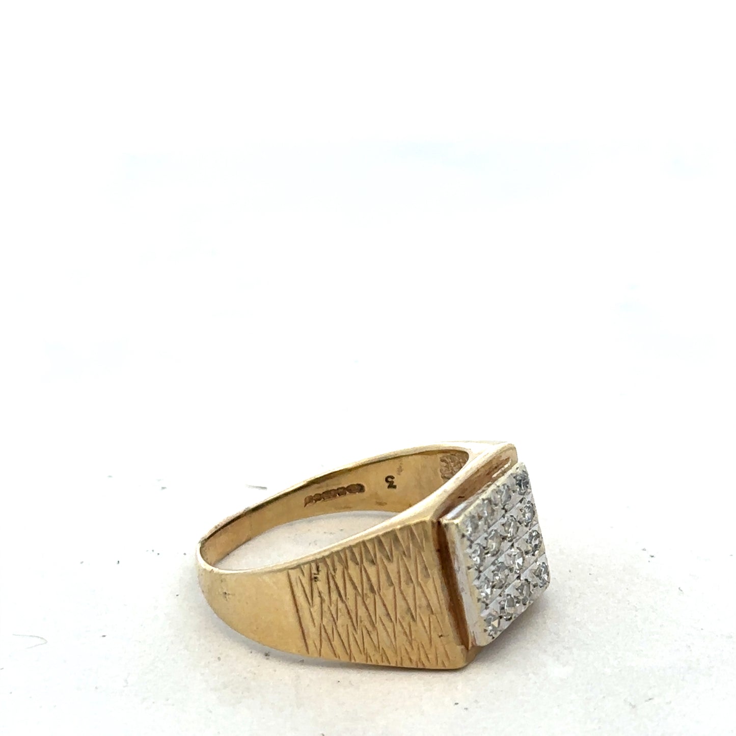 9ct yellow gold diamond signet ring in size V with engraved design, crafted by Reeves and Sons.