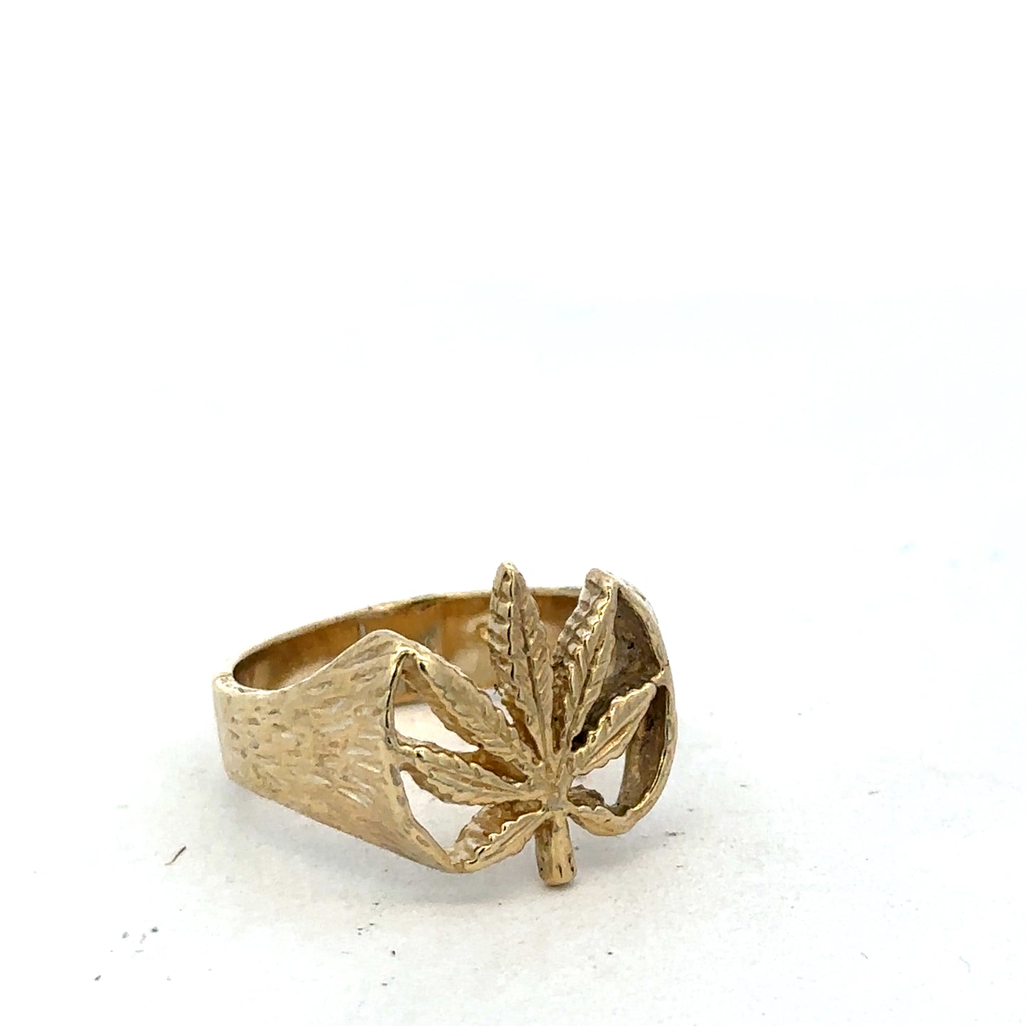 9ct yellow gold ring size U1/2 from Reeves and Sons, featuring a polished band and classic design, shown on a plain background.