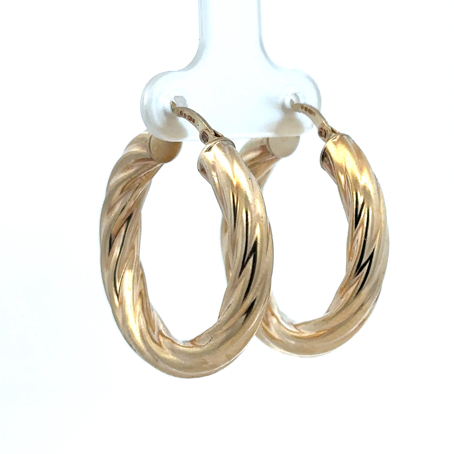 Reeves and Sons 9ct yellow gold hoop earrings, medium-sized, shiny, with a smooth polished finish, weighing 5.5g.