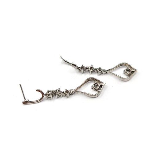 14ct white gold diamond drop earrings with 0.21 carats of sparkling diamonds, elegant jewelry accessory.