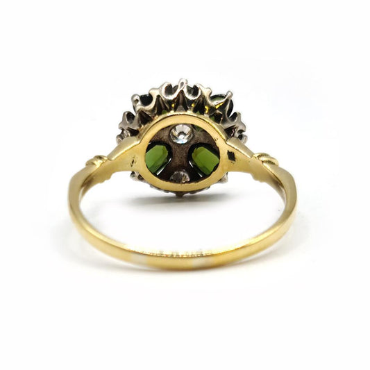 18ct gold ring featuring a 1-carat peridot gemstone accented with small diamonds, elegant jewelry piece.