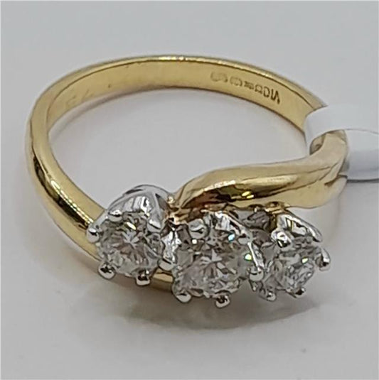 18ct gold diamond ring with 0.75ct center stone, size L, featuring a sleek band and sparkling diamonds.