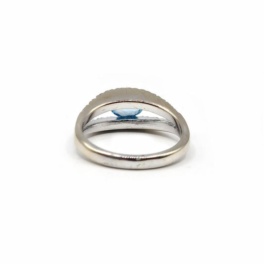 18ct white gold ring featuring a 0.40 carat topaz and 0.45 carat diamond accents, elegant jewelry accessory.