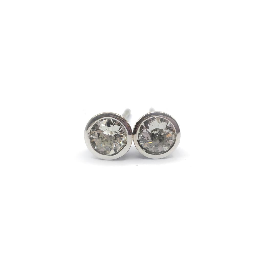 18ct white gold diamond stud earrings with 0.90 carats of sparkling diamonds, featuring a classic and elegant design.