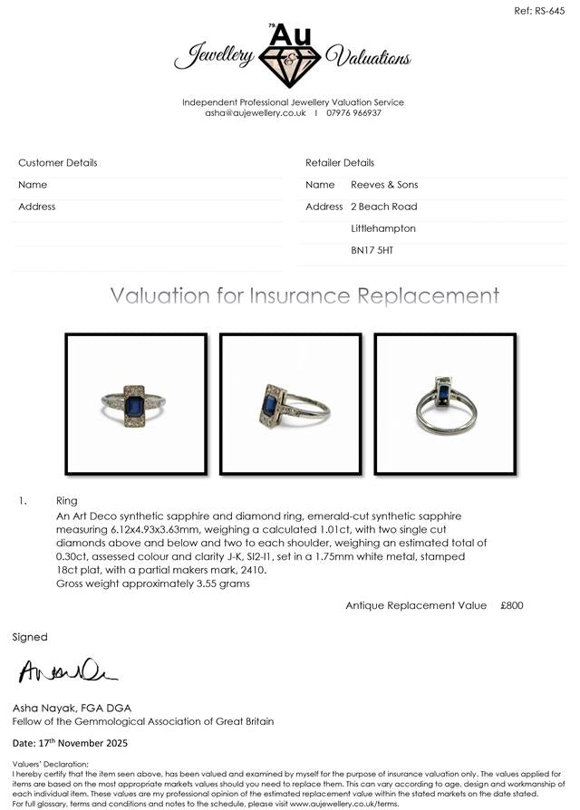 18ct white gold and platinum diamond and sapphire ring with intricate design and gemstone accents.