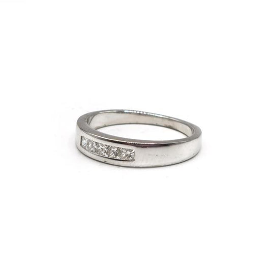 18ct white gold diamond ring with a sparkling central diamond, elegant design, unbranded jewelry for special occasions.