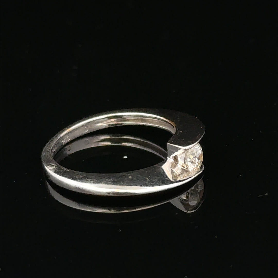 Unbranded 18ct white gold diamond ring size K1/2, showcasing a sparkling diamond design on a polished band.