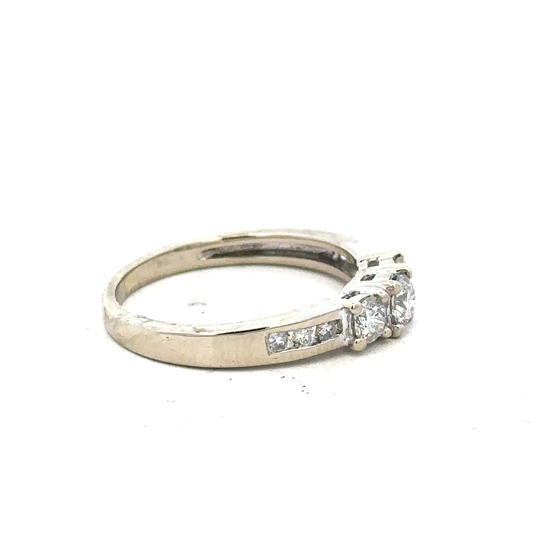 18ct white gold diamond ring in size L with sparkling diamonds, unbranded jewelry showcasing elegant craftsmanship.