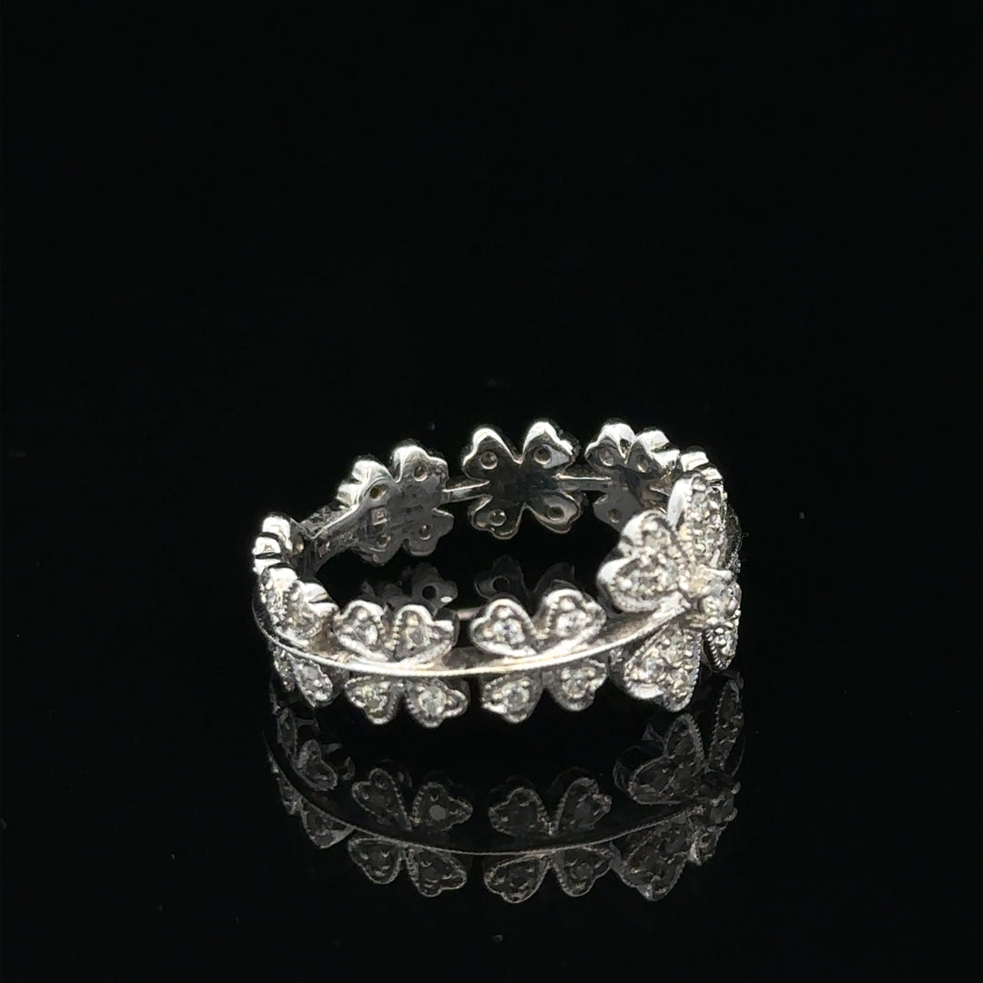 18ct white gold diamond ring size N with sparkling diamonds and a sleek band, unbranded jewelry design.