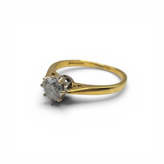18ct yellow gold diamond ring with 1/2 carat total weight, featuring a sleek design and sparkling diamonds.