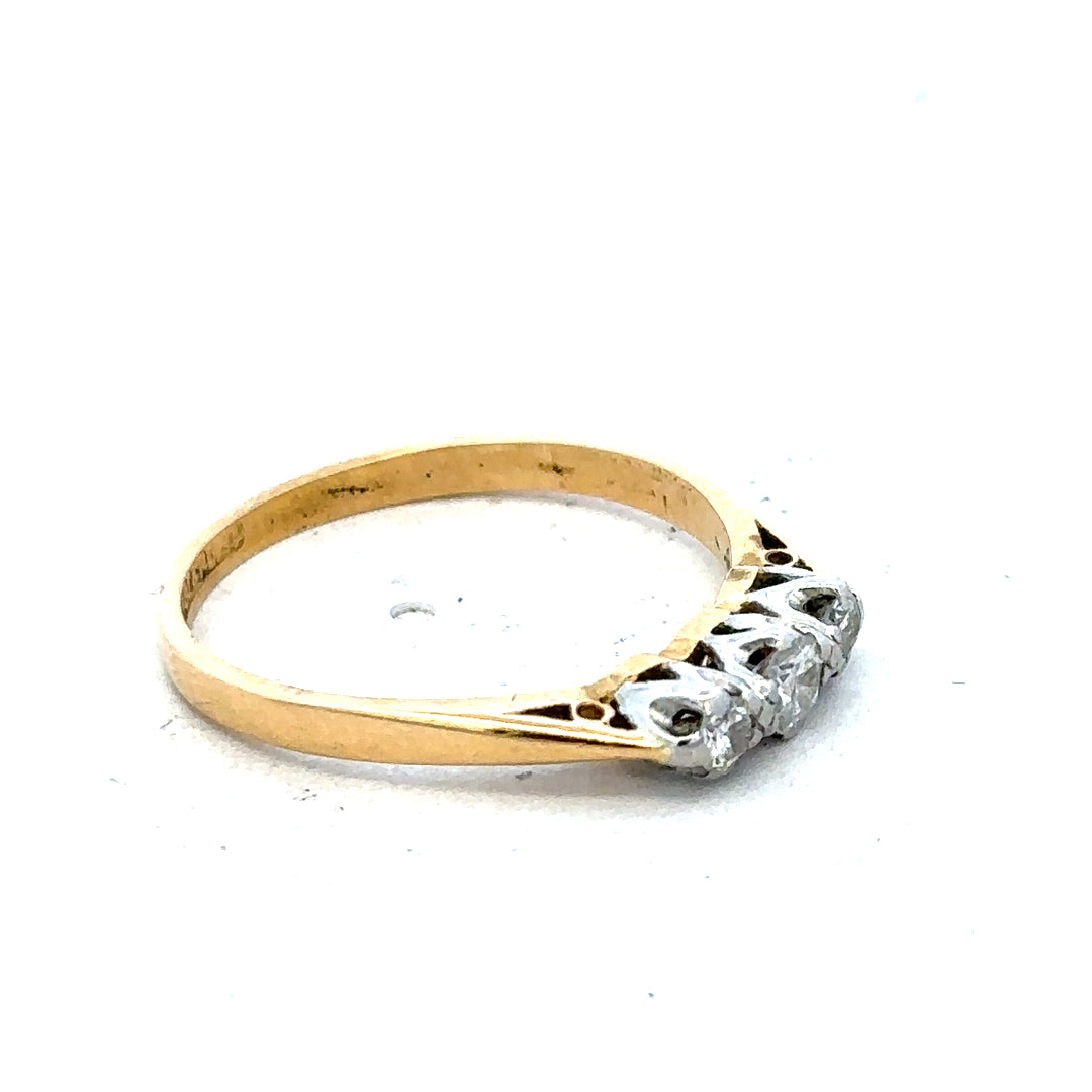 18ct yellow gold diamond ring in size P1/2, featuring a sparkling diamond setting and a simple, elegant design.