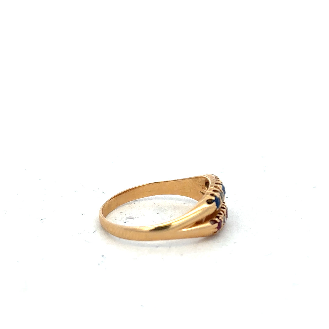 18ct yellow gold ring featuring diamonds, rubies, and sapphires in size P with intricate gemstone details.