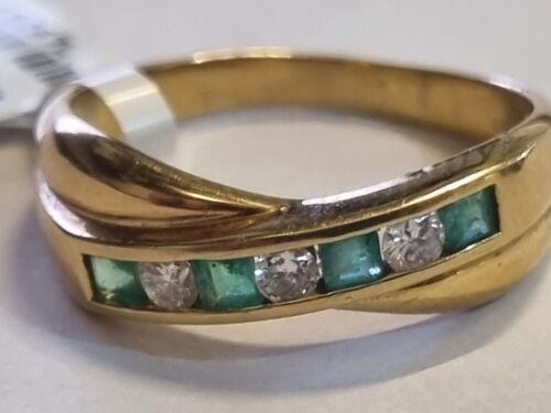 18ct yellow gold emerald and diamond half eternity ring with alternating gemstones, elegant and sparkling jewelry piece.