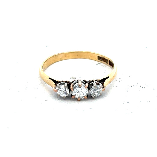 18ct yellow gold three-diamond ring in size L, featuring a classic and elegant design with sparkling diamonds.