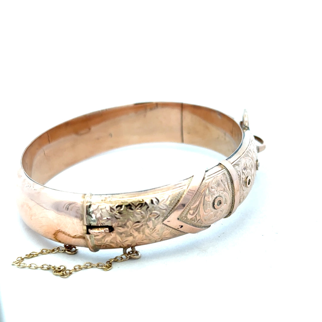 9ct gold bracelet bangle weighing 17.9g, unbranded, with a smooth polished finish, shown in a close-up image.