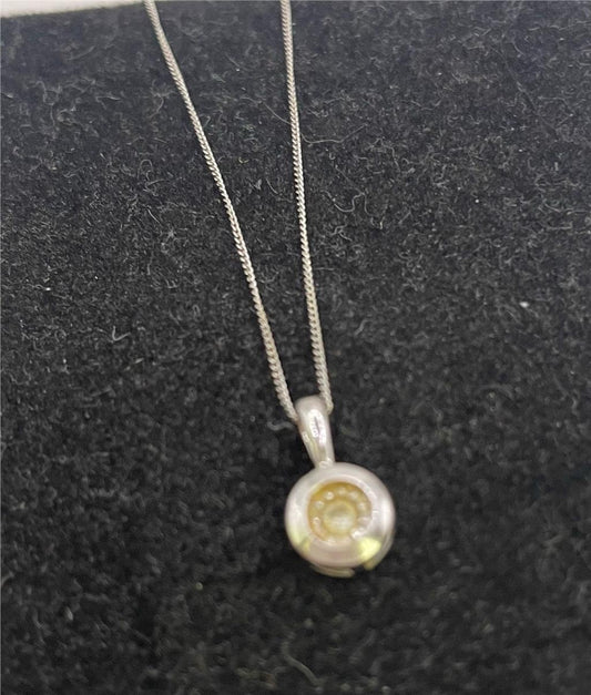 9ct white gold chain with pendant, unbranded jewelry, showcasing a sleek and elegant design in a close-up image.