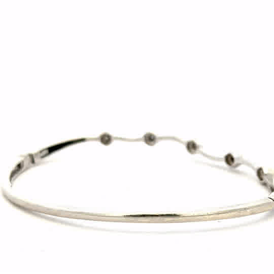 9ct white gold diamond bracelet with sparkling diamonds, unbranded, showcasing elegant design and fine craftsmanship.