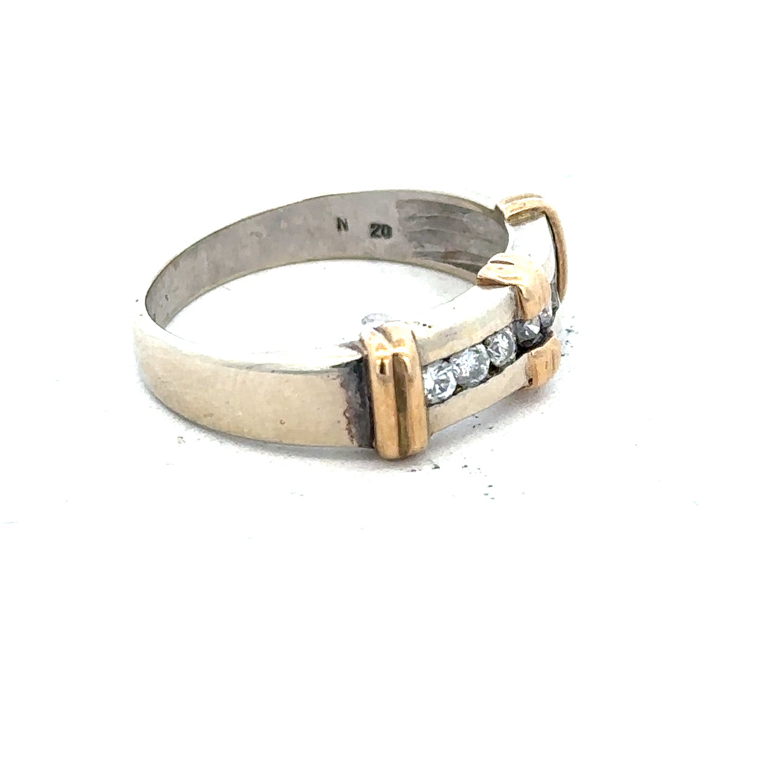 9ct white gold diamond ring featuring a sparkling central diamond and a sleek band, elegant jewelry piece.