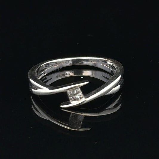 9ct white gold diamond ring in size O with sparkling diamonds, showcasing elegant craftsmanship and a sleek design.