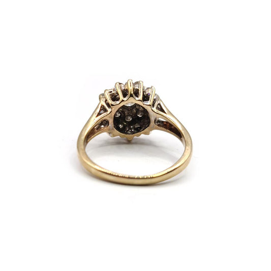 9ct yellow gold diamond cluster ring with 1-carat total weight, featuring a sparkling diamond design and a polished band.
