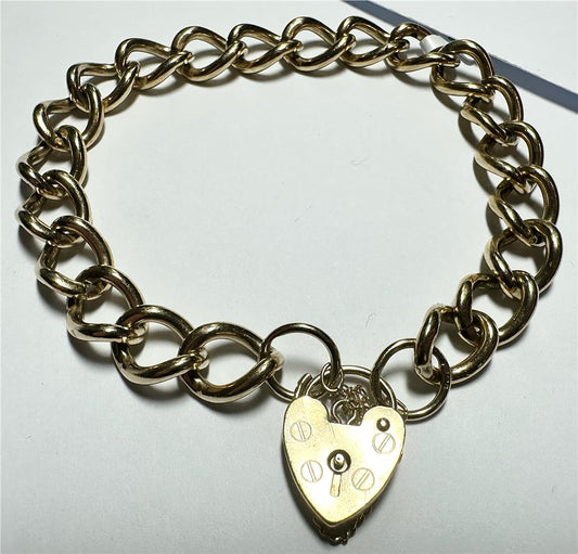 9ct yellow gold bracelet with a smooth design, weighing 26.3 grams, crafted in unbranded jewelry style.