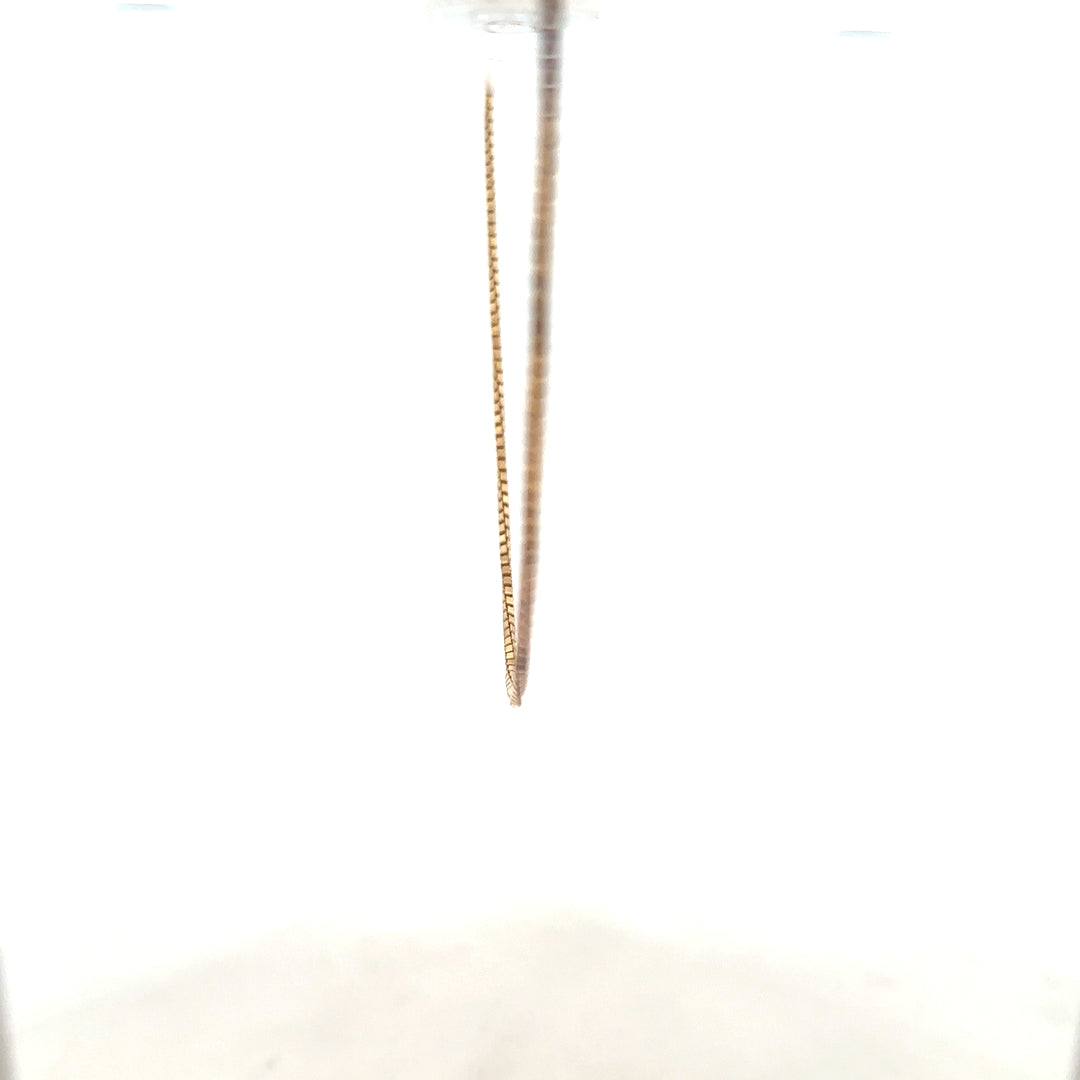 9ct yellow gold chain weighing 6.1g, unbranded jewelry chain with a classic design, shown in close-up image.