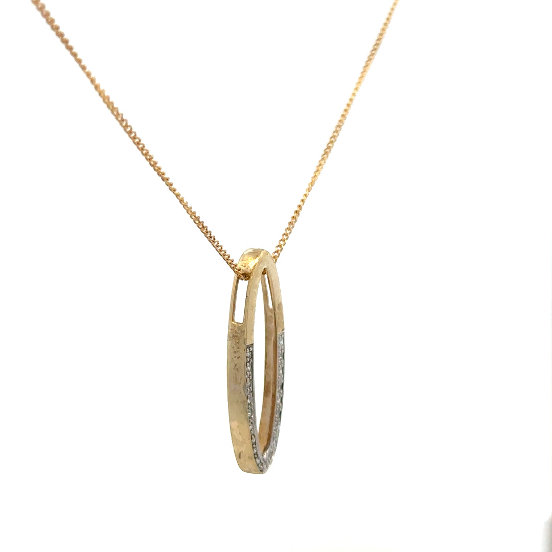 9ct yellow gold chain with diamond pendant, sleek jewelry piece, unbranded, showcasing shiny gold and sparkling diamond accents.