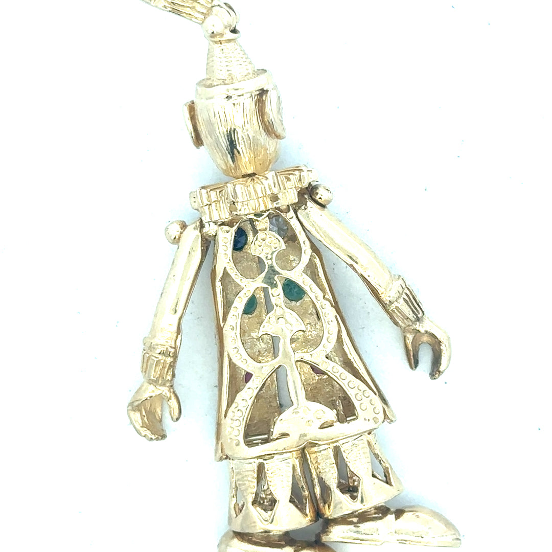 9ct yellow gold clown pendant weighing 20.3g, unbranded jewelry with detailed clown design and polished finish.