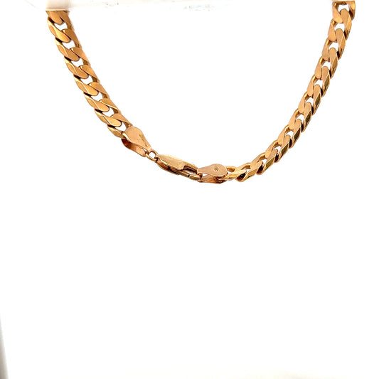 9ct yellow gold curb bracelet with a smooth chain design and polished finish, weighing 17.1 grams.