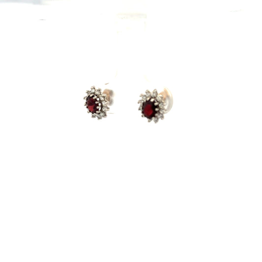 9ct yellow gold earrings weighing 1.2g, unbranded, featuring a classic design with a polished finish.