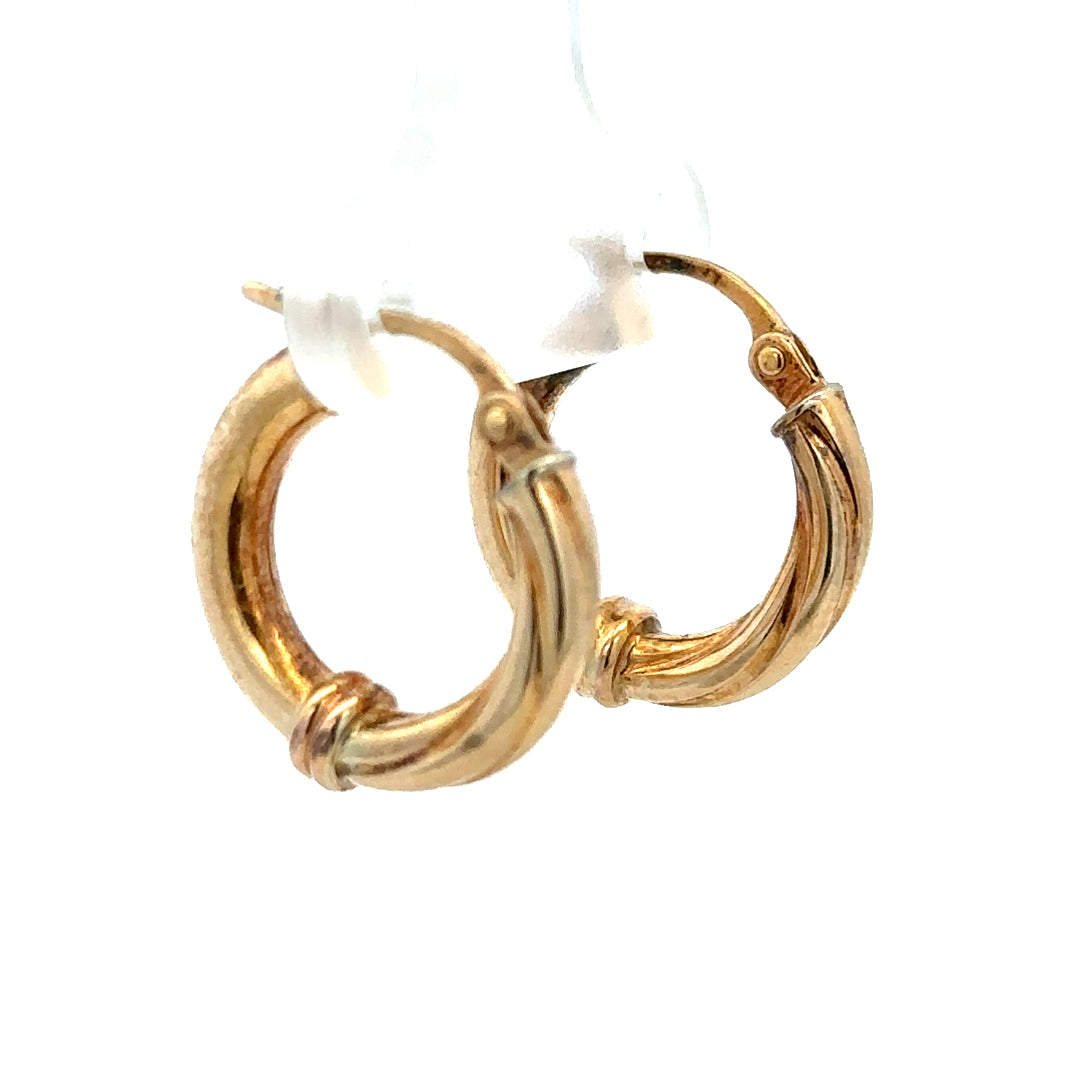 9ct yellow gold hoop earrings weighing 1.5g, simple and elegant jewelry with a polished finish, unbranded design.