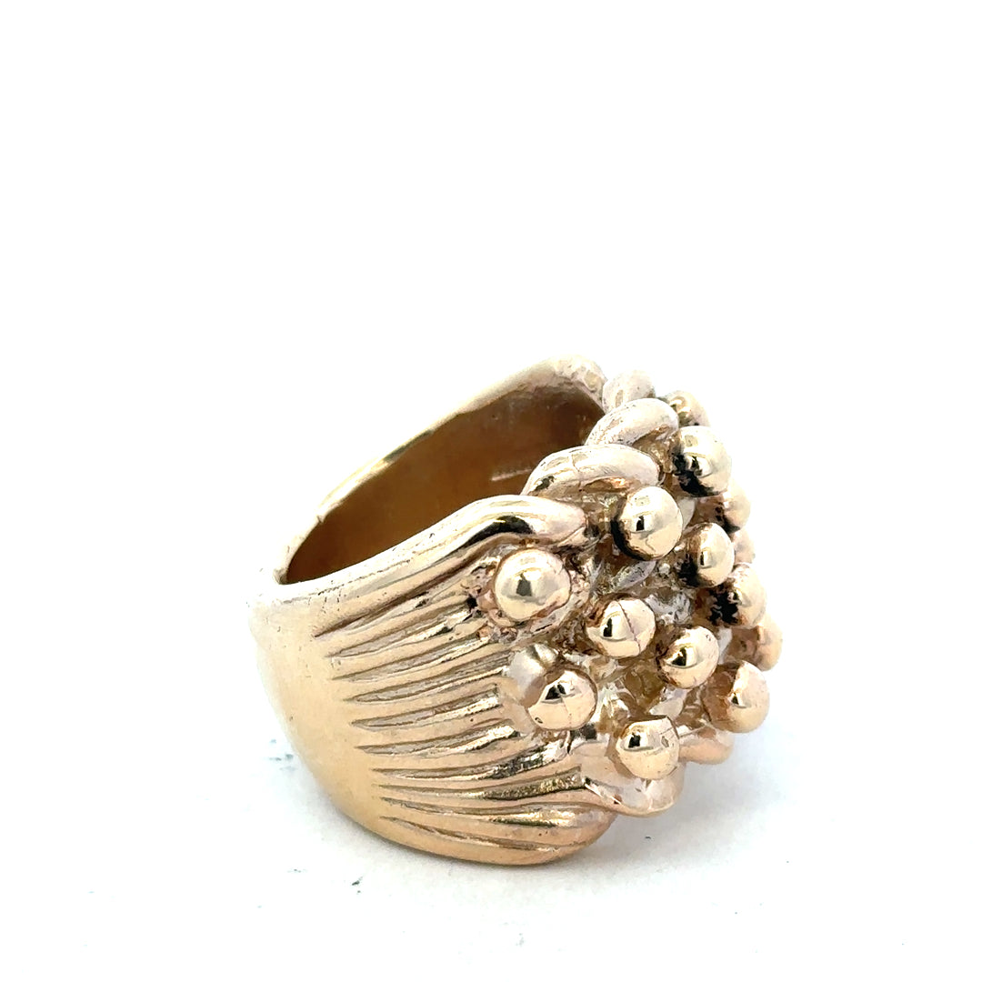 9ct yellow gold keeper ring in size W, unbranded, featuring a smooth band with a secure keeper design for jewelry protection.