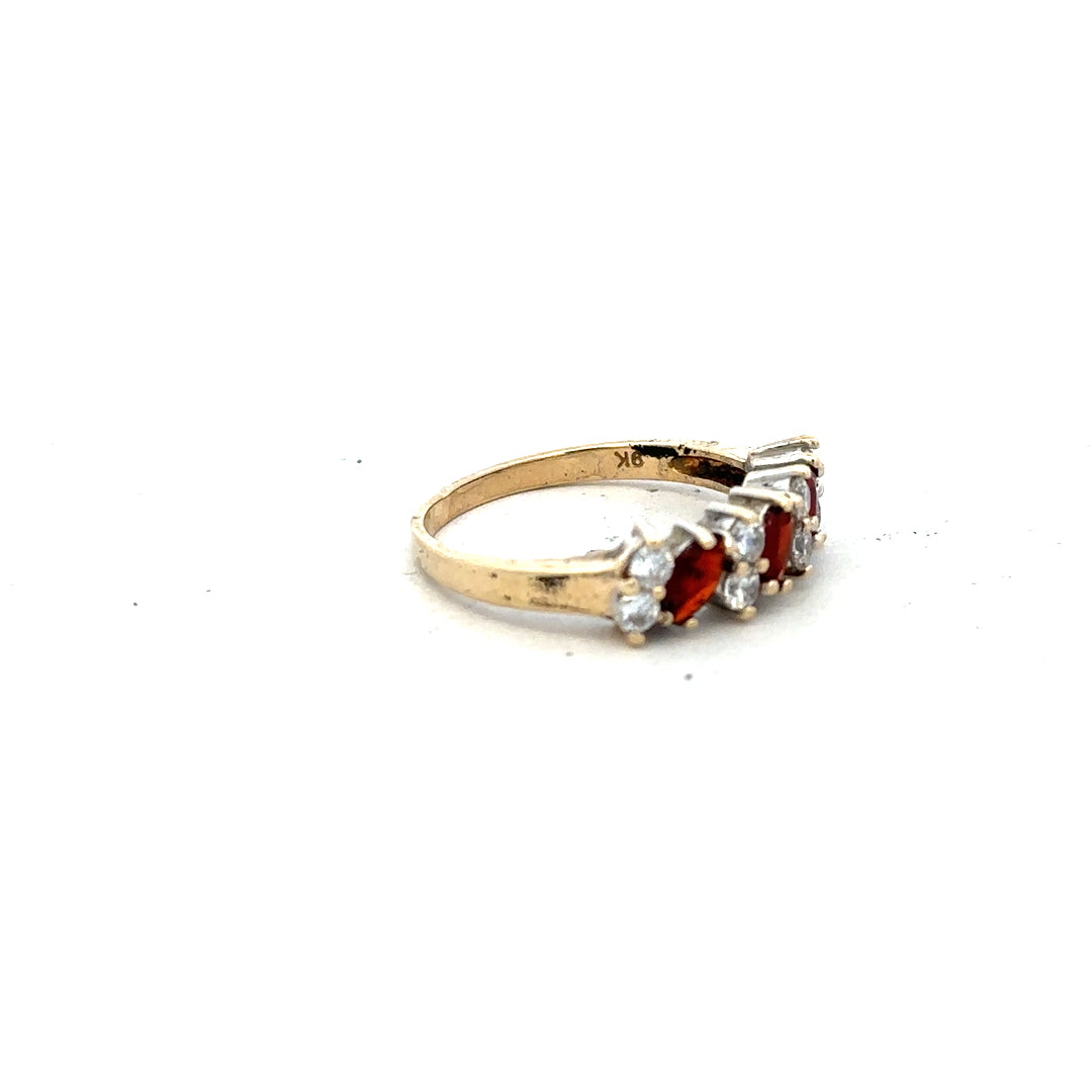 9ct yellow gold ring in size L 1/2 with a simple band design, unbranded jewelry displayed on a plain background.