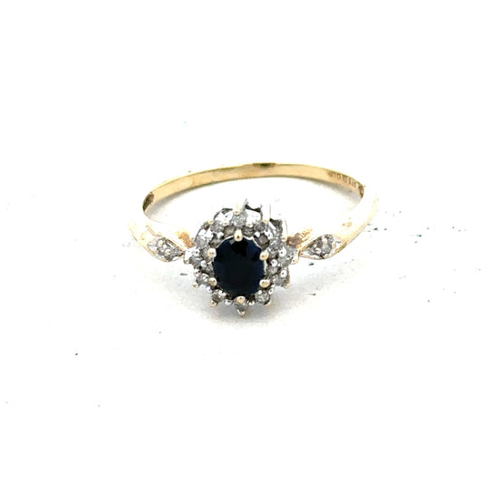 9ct yellow gold sapphire and diamond ring in size P, featuring a vibrant sapphire centerpiece with sparkling diamonds.