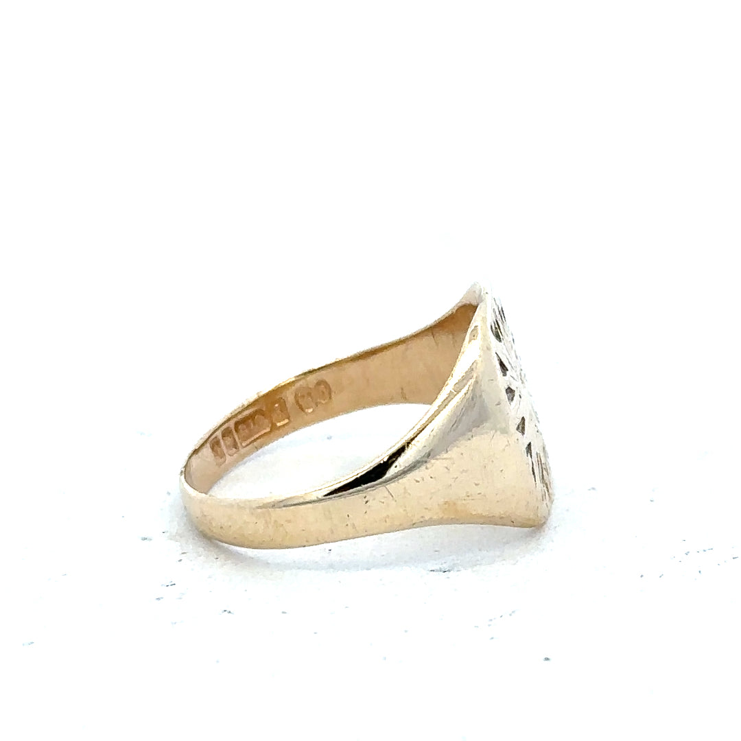 9ct yellow gold signet ring in size S, unbranded, with smooth polished surface and classic design, shown on a plain background.