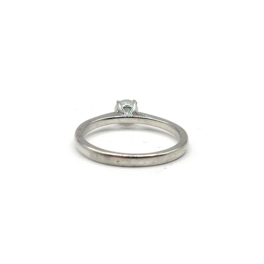 Platinum 0.26 carat diamond solitaire ring featuring a single sparkling diamond set on a sleek platinum band.