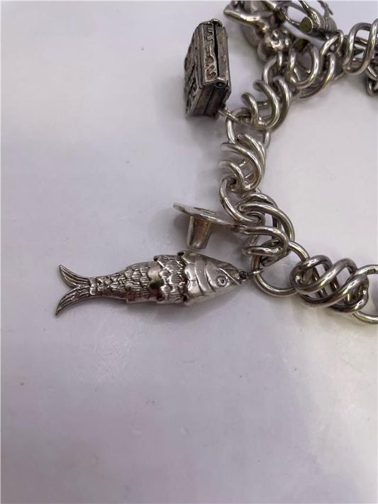 Silver bracelet weighing 73.5g with intricate design, unbranded jewelry accessory for stylish wear