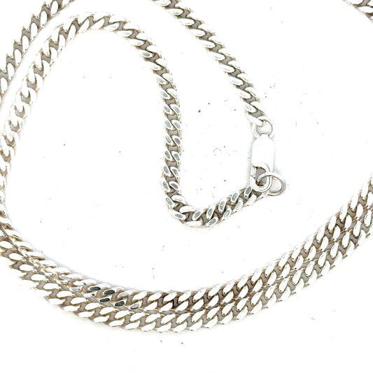 Silver curb chain weighing 24.8g, featuring classic linked design, suitable for jewelry making or wearing as a stylish accessory.